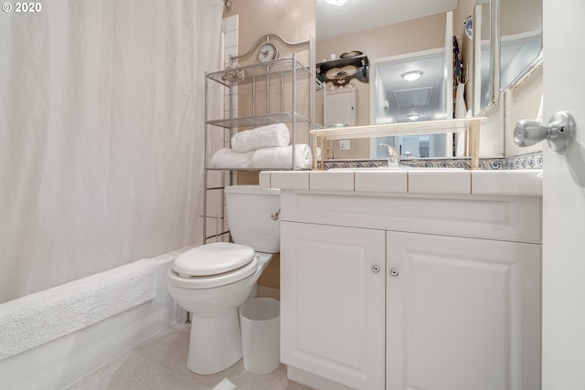 bathroom with oversized vanity, toilet, and tile floors