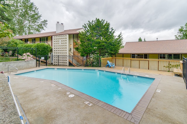 view of pool with a patio area