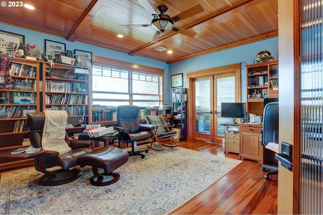 office space with ceiling fan, light hardwood / wood-style floors, wooden ceiling, and french doors