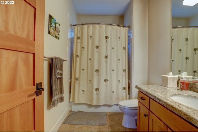 full bathroom featuring vanity, tile patterned flooring, toilet, and shower / tub combo with curtain