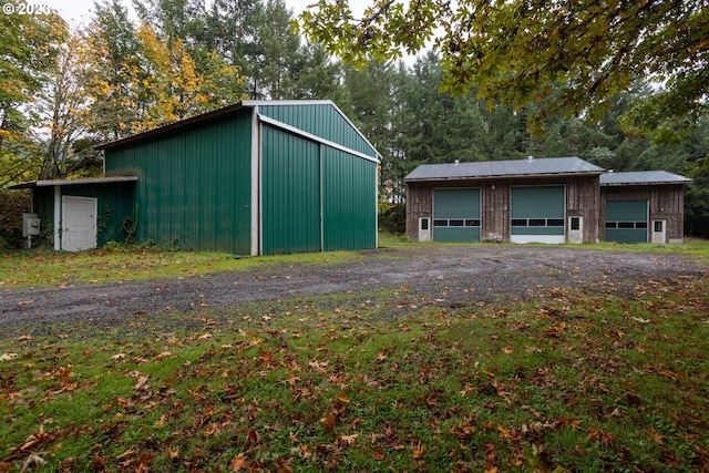 view of outbuilding with a garage