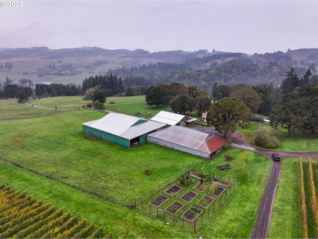 aerial view featuring a mountain view and a rural view