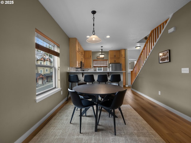 87916 E Alpenglow Ln, Government Camp, OR 97028 - dining space featuring baseboards, light wood finished floors, and recessed lighting