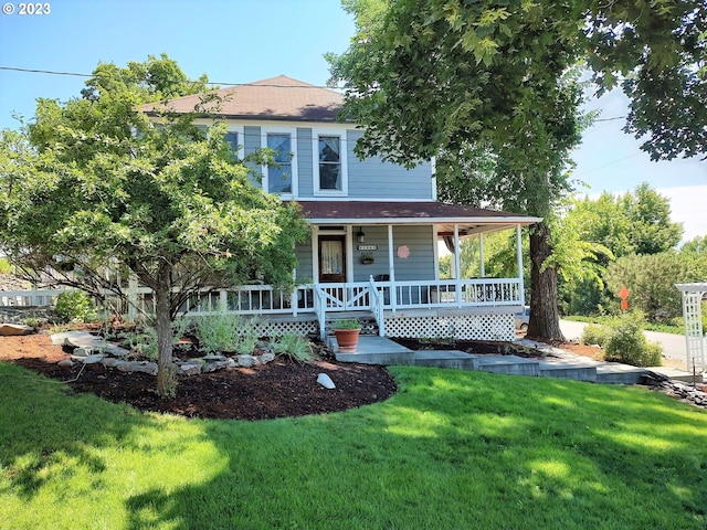 206 NE Front St, Prairie City, OR 97869 - view of front of home featuring covered porch and a front yard