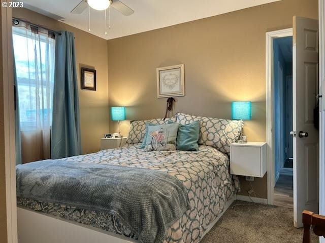 206 NE Front St, Prairie City, OR 97869 - carpeted bedroom featuring ceiling fan