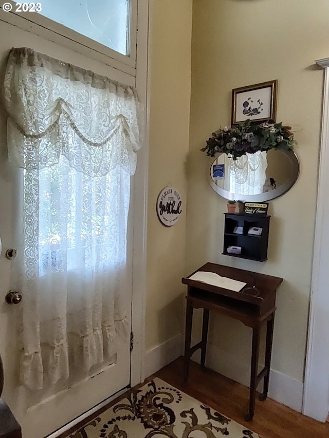 206 NE Front St, Prairie City, OR 97869 - doorway featuring hardwood / wood-style floors