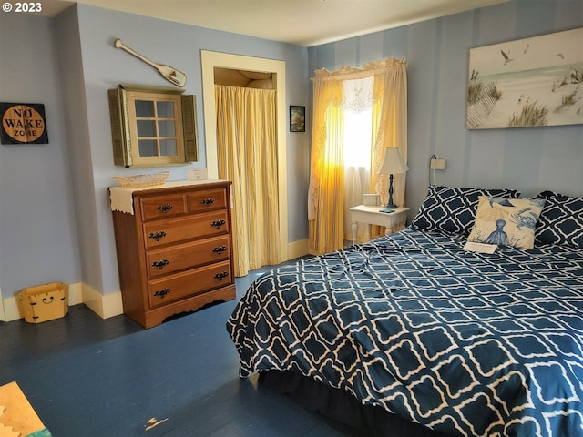 206 NE Front St, Prairie City, OR 97869 - bedroom with dark wood-type flooring