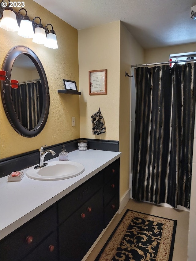 206 NE Front St, Prairie City, OR 97869 - bathroom with vanity and shower / tub combo