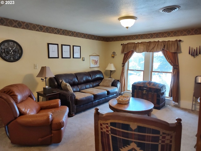206 NE Front St, Prairie City, OR 97869 - carpeted living room with a textured ceiling