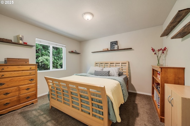 38225 Hiagua Ln N, Nehalem, OR 97131 - bedroom featuring dark colored carpet and baseboards