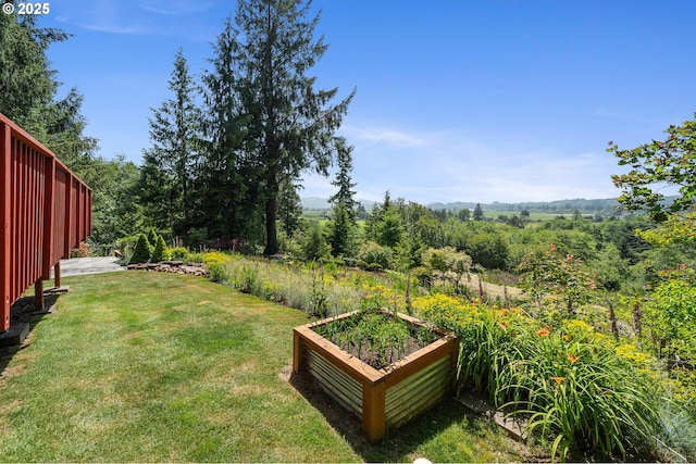 38225 Hiagua Ln N, Nehalem, OR 97131 - view of green lawn featuring a vegetable garden