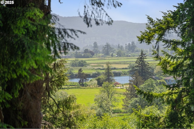 38225 Hiagua Ln N, Nehalem, OR 97131 - mountain view featuring rural landscape and a nearby body of water