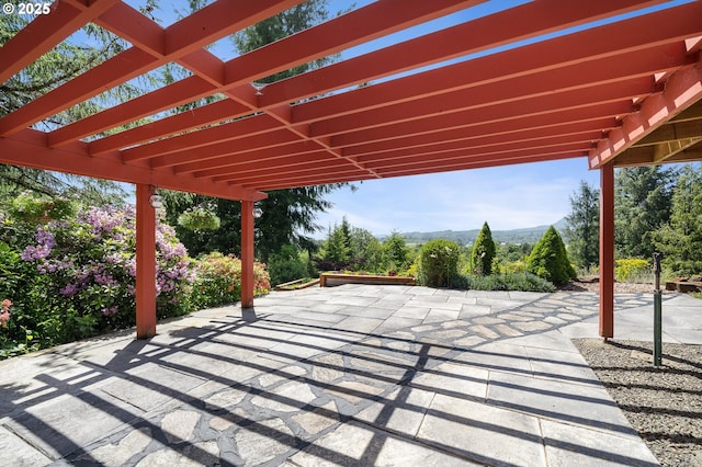 38225 Hiagua Ln N, Nehalem, OR 97131 - view of patio with a pergola and a mountain view