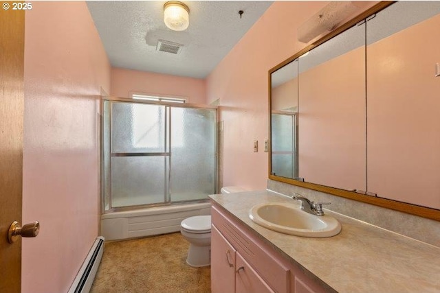 2107 Cove Ave, La Grande, OR 97850 - full bathroom featuring vanity, shower / bath combination with glass door, a baseboard heating unit, and a textured ceiling