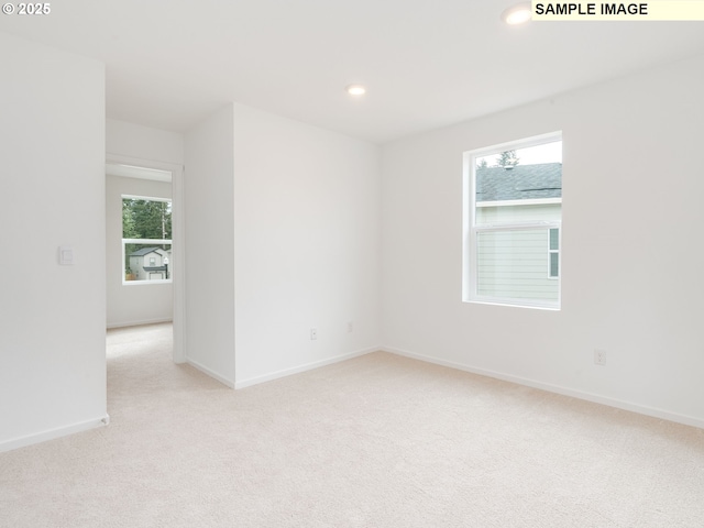5506 NE 66th Pl, Vancouver, WA 98661 - empty room with light carpet, baseboards, and recessed lighting