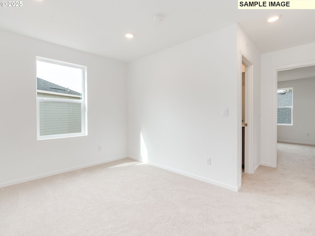 5506 NE 66th Pl, Vancouver, WA 98661 - unfurnished room with baseboards, light carpet, and recessed lighting