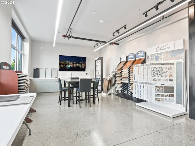 dining room with rail lighting