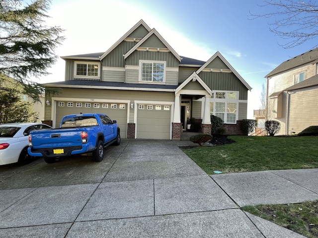 craftsman-style home featuring a front lawn and a garage