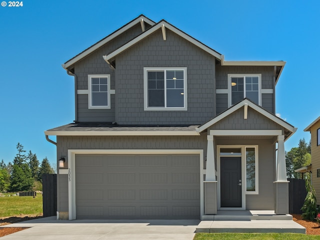 craftsman-style home with a garage