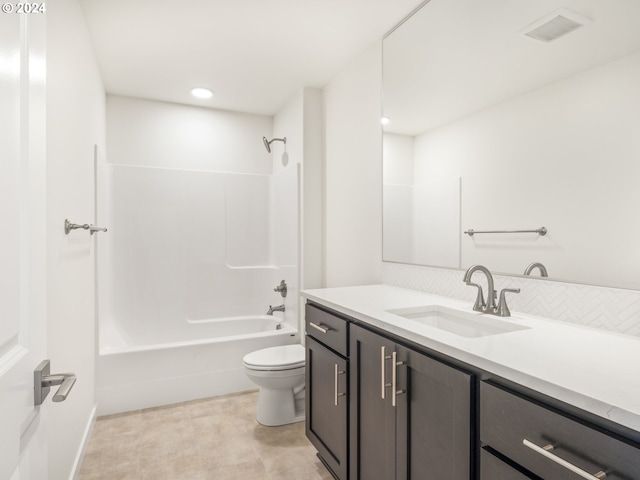 full bathroom featuring shower / bathing tub combination, decorative backsplash, vanity, and toilet