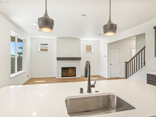 kitchen featuring sink and hanging light fixtures