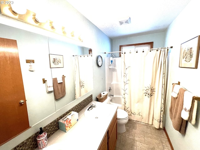 full bathroom featuring shower / bathtub combination with curtain, vanity, and toilet