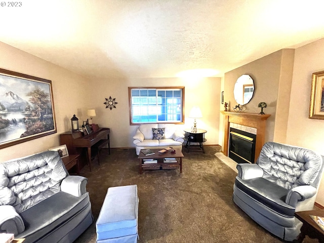 carpeted living room featuring a textured ceiling