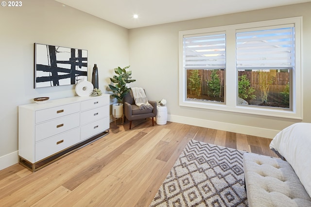 sitting room with light hardwood / wood-style flooring