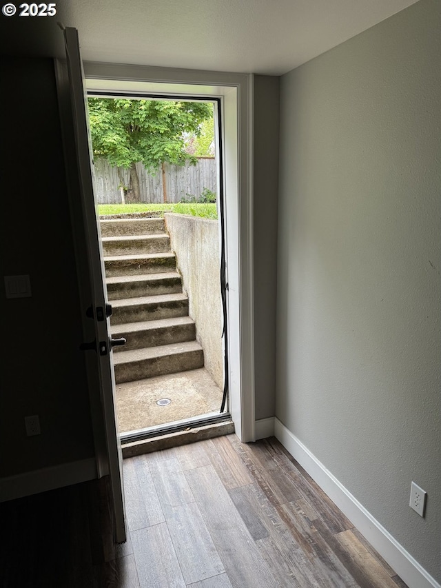 1427 SE 109th Ave, Portland, OR 97216 - doorway to outside featuring wood finished floors and baseboards