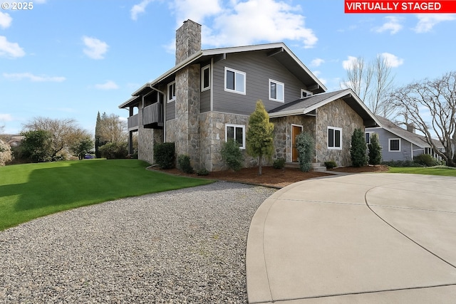 21503 NE Lachenview Ln, Fairview, OR 97024 - view of front facade featuring stone siding, a chimney, and a front lawn