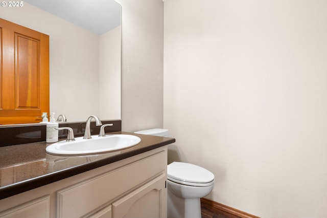 21503 NE Lachenview Ln, Fairview, OR 97024 - bathroom with vanity, toilet, and wood finished floors