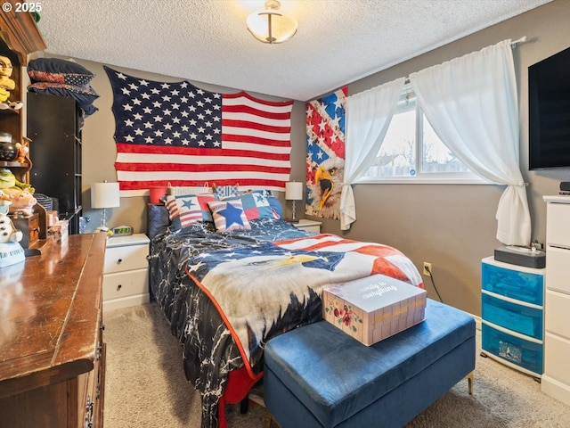 carpeted bedroom featuring a textured ceiling