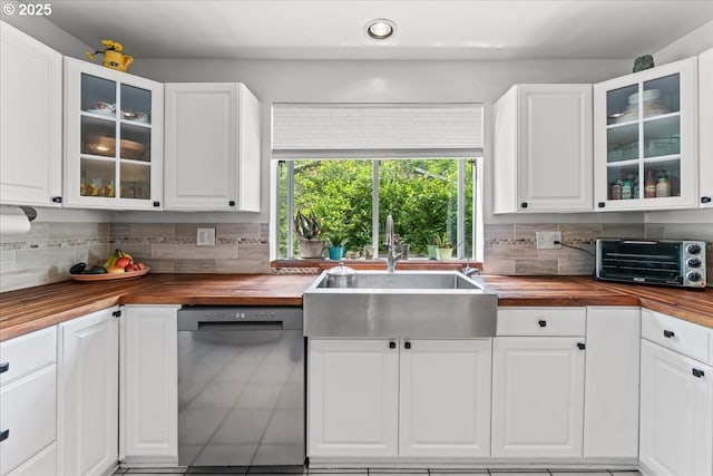 5850 SW Vermont St, Portland, OR 97219 - kitchen featuring butcher block counters, dishwasher, a sink, tasteful backsplash, and recessed lighting
