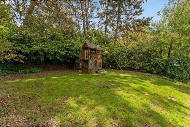 5850 SW Vermont St, Portland, OR 97219 - view of grassy yard featuring a playground