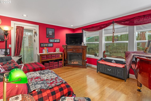 11215 NE 359th St, La Center, WA 98629 - bedroom with ornamental molding, wood finished floors, a fireplace, and recessed lighting