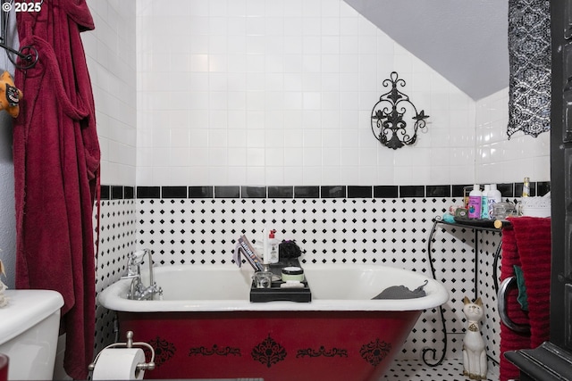 11215 NE 359th St, La Center, WA 98629 - bathroom featuring a freestanding tub, toilet, and tile walls