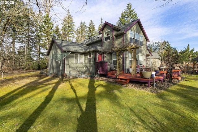 11215 NE 359th St, La Center, WA 98629 - rear view of property with a lawn and a deck