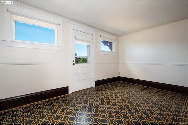 view of tiled foyer entrance