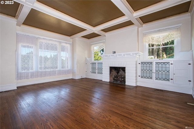 unfurnished living room with beam ceiling, coffered ceiling, a fireplace, and dark wood-type flooring