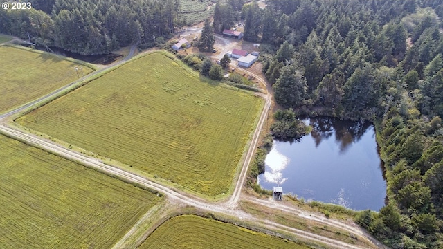 aerial view with a rural view and a water view