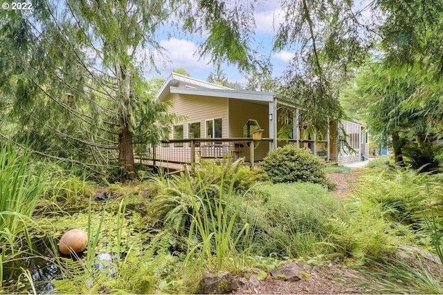 exterior space featuring a deck