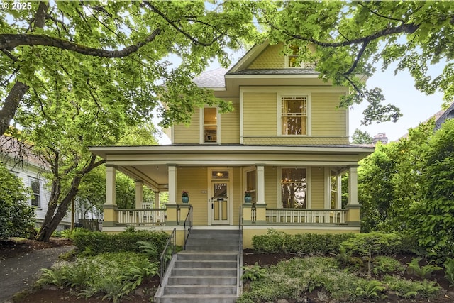 2147 NE 14th Ave, Portland, OR 97212 - victorian-style house with covered porch and stairway