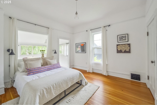 2147 NE 14th Ave, Portland, OR 97212 - bedroom with light wood-type flooring and baseboards