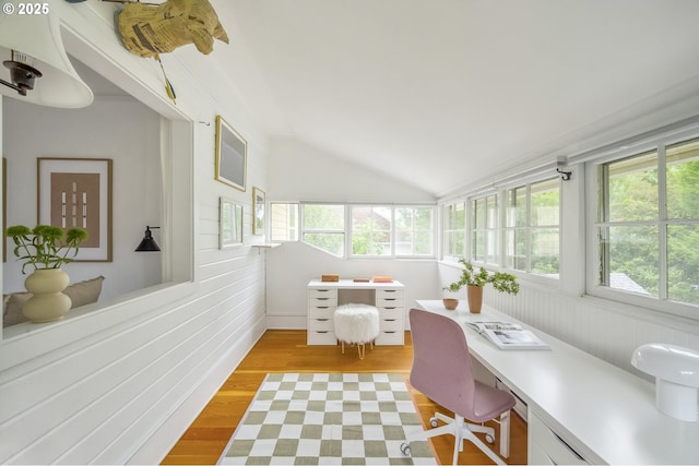 2147 NE 14th Ave, Portland, OR 97212 - sunroom / solarium with healthy amount of natural light, lofted ceiling, and wood finished floors