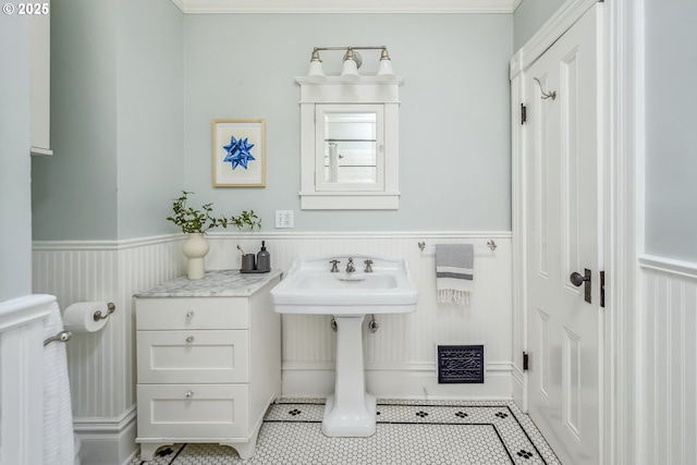 2147 NE 14th Ave, Portland, OR 97212 - bathroom with wainscoting and tile patterned flooring