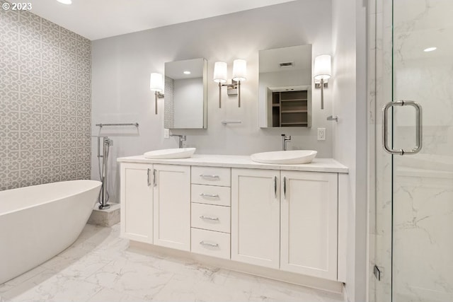 bathroom with dual bowl vanity, tile walls, plus walk in shower, and tile floors