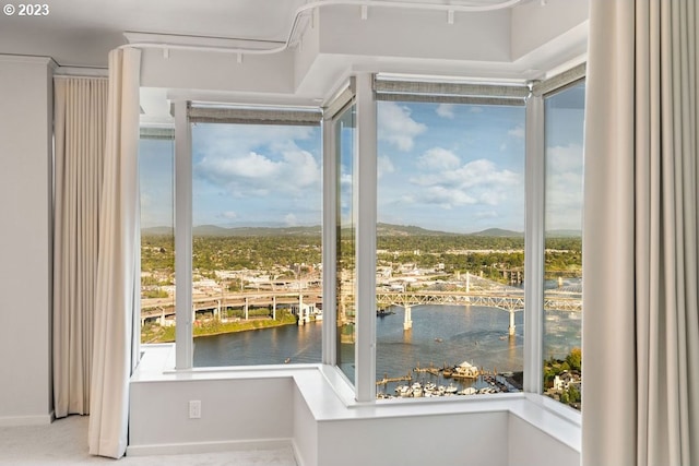 entryway featuring a water view