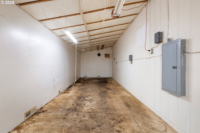 basement featuring electric panel