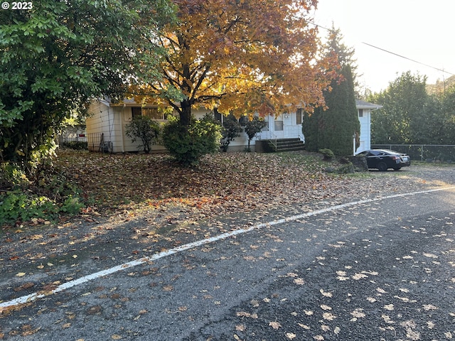 view of side of home with fence