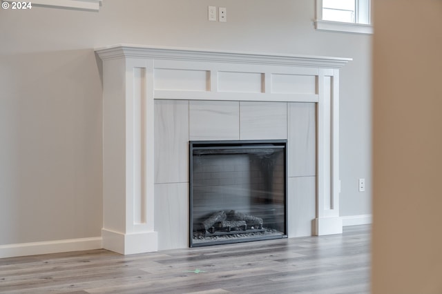 details with hardwood / wood-style flooring